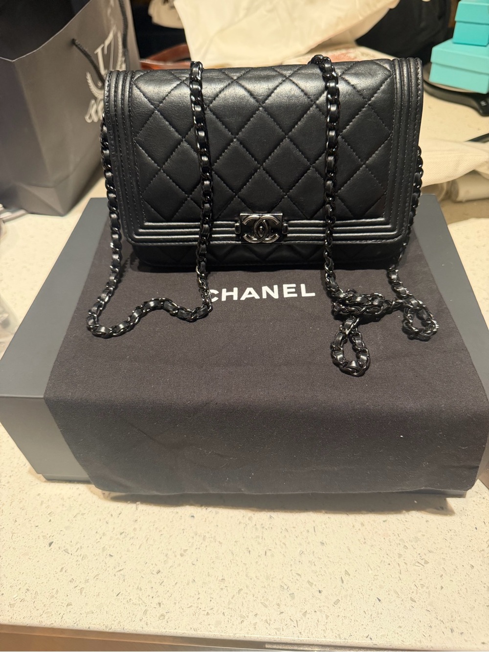 CHANEL Black WOC Quilted Lambskin Crossbody Bag with Chain Strap